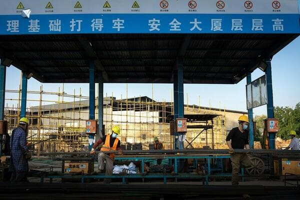 Construction workers from Nepal and India on a building site in Mauritius