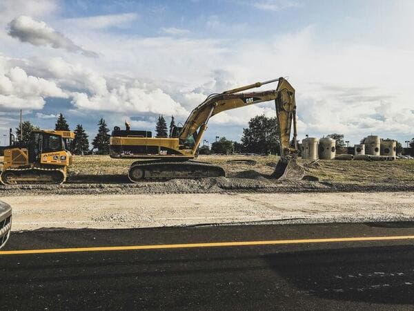 Excavator operator working on a construction site